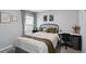 Comfortable bedroom with natural light, decorated with stylish accents and a dedicated workspace at 2812 Rock Sound St, Bradenton, FL 34208
