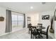 Inviting dining area featuring a table with seating for four, and view to the entryway at 2812 Rock Sound St, Bradenton, FL 34208