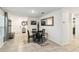 Bright dining room with a round table, seating for four, and contemporary decor at 2812 Rock Sound St, Bradenton, FL 34208