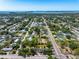 Extensive aerial view of the residential area; ocean and urban views are present in the background at 2840 S Shade Ave, Sarasota, FL 34239