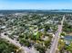 Wide aerial view of residential homes with ocean views in background of well-kept neighborhoods at 2840 S Shade Ave, Sarasota, FL 34239