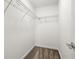 Walk-in closet featuring wire shelving for ample storage and a carpeted floor at 2840 S Shade Ave, Sarasota, FL 34239
