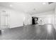 Expansive living area with tile floors, bright lighting, and open access to the modern kitchen at 2840 S Shade Ave, Sarasota, FL 34239