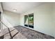 The screened-in patio features stylish brick flooring and sliding glass door access at 2840 S Shade Ave, Sarasota, FL 34239