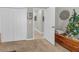 Bedroom with closet and chest with holiday decorations in a neutral color scheme at 2918 130Th E Ave, Parrish, FL 34219
