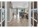 Comfortable living room with neutral tones, leading to an outdoor patio and pool area at 2918 130Th E Ave, Parrish, FL 34219