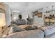 Open living room area showing tile flooring and stylish decor; bright and inviting at 2918 130Th E Ave, Parrish, FL 34219