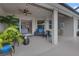 Outdoor patio with comfortable seating and beautiful landscaping at 2918 130Th E Ave, Parrish, FL 34219