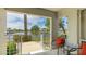 Inviting balcony offers tranquil waterfront views and a cozy seating area to relax at 304 108Th W St, Bradenton, FL 34209