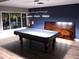 Billiard room showcasing a pool table and elegant lighting, perfect for recreation and leisure at 304 108Th W St, Bradenton, FL 34209