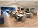 Large clubhouse with tables, chairs, and a relaxing atmosphere for community members at 304 108Th W St, Bradenton, FL 34209