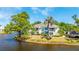 Charming waterfront condo featuring serene water views and inviting outdoor balconies at 304 108Th W St, Bradenton, FL 34209
