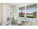 Charming breakfast nook with scenic water views, creating a delightful dining experience at 304 108Th W St, Bradenton, FL 34209