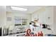 Clean, compact kitchen area with modern appliances and a bright window view at 304 108Th W St, Bradenton, FL 34209