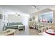Cozy living room area with tile flooring and casual dining space at 304 108Th W St, Bradenton, FL 34209