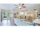 Comfortable living room featuring access to the outdoors and a scenic water view at 304 108Th W St, Bradenton, FL 34209