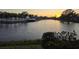 Water view at sunset, offering serene views of the surrounding community at 304 108Th W St, Bradenton, FL 34209