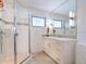 Modern bathroom features glass enclosed shower, contemporary vanity, and stylish tile, offering a spa-like experience at 3201 Casey Key Rd, Nokomis, FL 34275