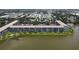 Aerial view of lakeside condominiums with ample parking at 3204 Lake Bayshore Dr # 407, Bradenton, FL 34205