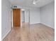Bedroom with light walls, wood-look flooring, and a ceiling fan at 3204 Lake Bayshore Dr # 407, Bradenton, FL 34205