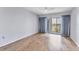 Light filled bedroom with a sliding glass door to the private lanai at 3204 Lake Bayshore Dr # 407, Bradenton, FL 34205