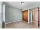 Bedroom featuring light-green walls and hardwood floors and closet at 3204 Lake Bayshore Dr # 407, Bradenton, FL 34205