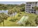 Lakeside community featuring a shuffleboard court at 3204 Lake Bayshore Dr # 407, Bradenton, FL 34205