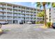 Spacious condominium building featuring multiple floors and resident parking at 3204 Lake Bayshore Dr # 407, Bradenton, FL 34205