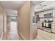 Modern kitchen with stainless steel appliances, ample cabinet space, and adjacent living room at 3204 Lake Bayshore Dr # 407, Bradenton, FL 34205