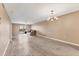 Spacious living room featuring natural light and a sliding door to a private balcony at 3204 Lake Bayshore Dr # 407, Bradenton, FL 34205