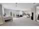 Spacious bedroom with neutral carpet, French doors to a balcony, and two beds at 3432 Founders Club Dr, Sarasota, FL 34240