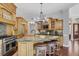 Spacious kitchen with granite island, modern appliances, and custom cabinetry at 3432 Founders Club Dr, Sarasota, FL 34240