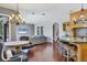 Open living space with kitchen island, dining area, and living room at 3432 Founders Club Dr, Sarasota, FL 34240