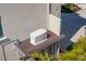 Generac generator providing backup power, mounted outside on a platform at 3465 Gulfmead Dr, Sarasota, FL 34242