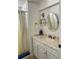 Classic bathroom features a vanity and tiled shower at 3710 Gulf Of Mexico Dr # A20, Longboat Key, FL 34228