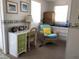 Cozy home office features a desk, chair and storage at 3710 Gulf Of Mexico Dr # A20, Longboat Key, FL 34228