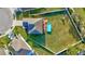 Aerial view of the property showing a large backyard, pool, and surrounding neighborhood at 4010 Lindever Ln, Palmetto, FL 34221