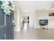 Welcoming entryway featuring tile flooring, neutral walls, and decorative accents at 4010 Lindever Ln, Palmetto, FL 34221