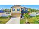 Attractive two-story home featuring a well-manicured lawn and welcoming curb appeal at 4010 Lindever Ln, Palmetto, FL 34221
