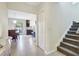 Hallway and staircase providing access to different areas of the home at 4010 Lindever Ln, Palmetto, FL 34221