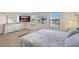 Light filled main bedroom featuring hard wood floors, contemporary decor, and updated features at 4010 Lindever Ln, Palmetto, FL 34221