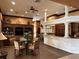 Spacious recreation room with stylish seating, a bar area, and warm lighting, ideal for socializing and entertainment at 4166 Central Sarasota Pkwy # 535, Sarasota, FL 34238