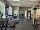 Well-equipped fitness center with modern exercise machines, mirrors, and large windows, promoting a healthy lifestyle at 4166 Central Sarasota Pkwy # 535, Sarasota, FL 34238