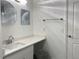 Bright bathroom boasts a vanity area with a mirror at 4166 Central Sarasota Pkwy # 535, Sarasota, FL 34238