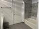 Clean bathroom features a tub, shower, and modern fixtures at 4166 Central Sarasota Pkwy # 535, Sarasota, FL 34238