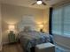Inviting bedroom with soft lighting and window at 4166 Central Sarasota Pkwy # 535, Sarasota, FL 34238