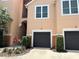 Lovely exterior of a condo building with garages at 4166 Central Sarasota Pkwy # 535, Sarasota, FL 34238