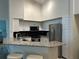 Modern kitchen with stainless steel appliances and granite countertops at 4166 Central Sarasota Pkwy # 535, Sarasota, FL 34238