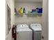 A conveniently located laundry room with washer and dryer at 4166 Central Sarasota Pkwy # 535, Sarasota, FL 34238