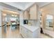 Modern kitchen with quartz countertops and stainless steel refrigerator at 4186 Heron Way # B-219, Bradenton, FL 34205